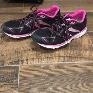 Black and fuchsia running shoes